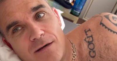 Robbie Williams seen completely starkers after addressing comments about his weight - www.manchestereveningnews.co.uk