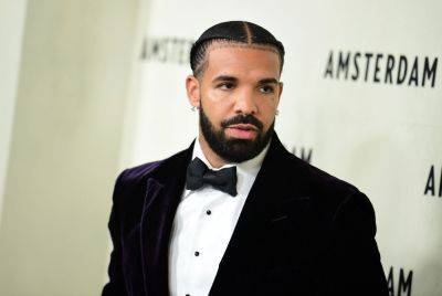 Drake Braids Son Adonis’ Hair In Adorable Snap, Playfully Fights With Lil Yachty In Comment Section - etcanada.com
