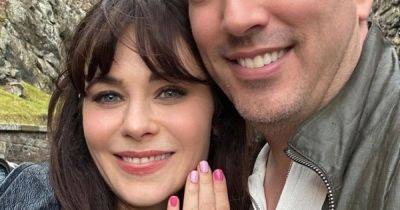 Zooey Deschanel gets engaged to Jonathan Scott in Scotland as she shows off incredible ring - www.dailyrecord.co.uk - Scotland - county Scott