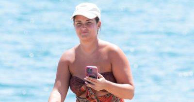 Jacqueline Jossa soaks up the sun in cutout swimsuit during beach day with two daughters - www.ok.co.uk - Spain