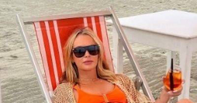 Amanda Holden branded a 'hot mama' as she sizzles in orange bikini - www.ok.co.uk - Britain - Italy - Greece