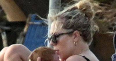 Boris Johnson's wife Carrie shows off rare glimpse of new baby in bikini-clad beach day - www.ok.co.uk - Greece