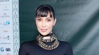 Kim Kardashian and Her New Blunt Bangs Met Meghan Markle's Mom - www.glamour.com
