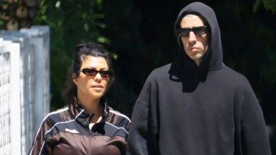 Pregnant Kourtney Kardashian Bares Her Baby Bump in Tracksuit While Out With Travis Barker - www.etonline.com - California