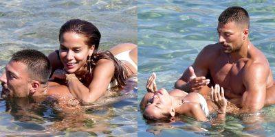Anitta Gets Playful with Simone Susinna at the Beach, Lays on Top of Him in the Ocean - www.justjared.com - Brazil - Italy - Greece - county Ocean