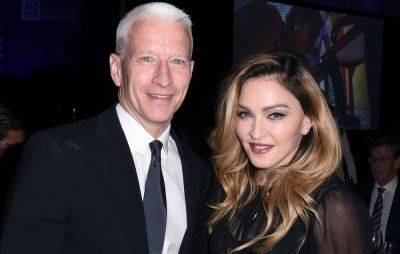 Anderson Cooper recalls “mortifying” experience of Madonna spanking and humping him on stage - www.nme.com - county Anderson - county Cooper