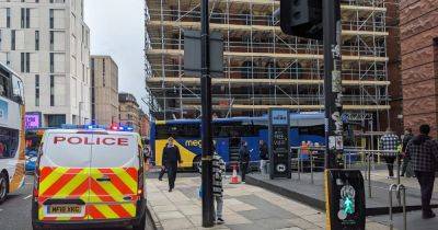 City centre street taped off and police and paramedics at scene after 'coach crashes into scaffolding' - www.manchestereveningnews.co.uk - Manchester - city Portland