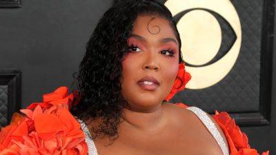Lizzo Spoke Out About Having a 'Rough Day' Ahead of Former Dancers' Harassment Lawsuit - www.etonline.com - county Williams - county Davis
