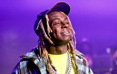 Lil Wayne says inspiring rappers to get face tattoos “feels amazing” - www.nme.com - New York