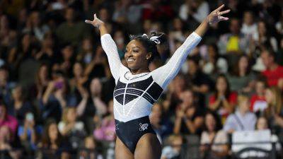 Simone Biles Takes Home Wins in First Gymnastics Meet in Two Years: See Her Impressive Performances - www.etonline.com - Illinois
