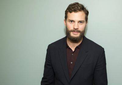 Jamie Dornan Admits His Daughters Are A Little Too Obsessed With Their ‘Wonder Woman’ Costume: ‘It’s Looking A Bit Sad That Suit’ - etcanada.com - Canada