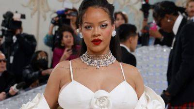 Pregnant Rihanna Is All Smiles While Breastfeeding Son RZA in New Maternity Bra -- See the Pics! - www.etonline.com