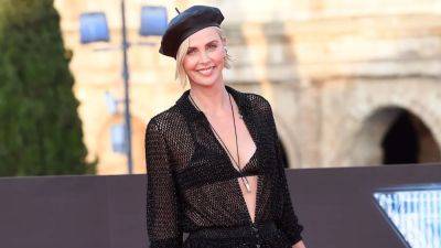Charlize Theron Dances With Her Kids at Taylor Swift's Concert: Watch the Rare Video - www.etonline.com - Los Angeles - California