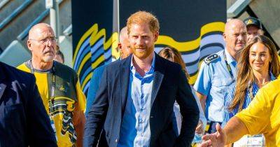 Prince Harry is all smiles at second day of Invictus Games - ahead of Meghan's arrival - www.ok.co.uk - county Hall - Ukraine - Germany