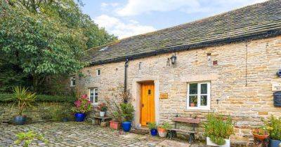 Inside the charming cottage on the outskirts of Greater Manchester that offers much more than first meets the eye - www.manchestereveningnews.co.uk - Manchester