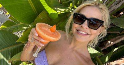 Holly Willoughby poses in bikini and shares snaps from wedding anniversary trip - www.ok.co.uk - Britain - Italy - Portugal - city Sandra