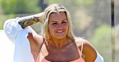 Kerry Katona shows off stunning 3 stone weight loss and packs on the PDA on Spanish holiday - www.ok.co.uk - Spain