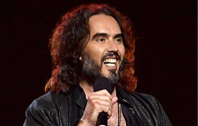 Russell Brand asks fans for financial support after YouTube revenue suspension - www.nme.com