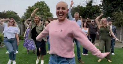 Strictly's Amy Dowden joyously dances with family after shaving head amid cancer battle - www.ok.co.uk