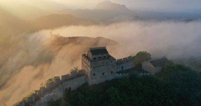 Two arrested for smashing a hole through Great Wall of China 'to make a shortcut' - www.manchestereveningnews.co.uk - China - city Beijing