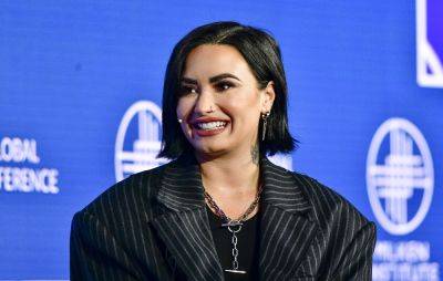 Demi Lovato signs new management deal after parting ways with Scooter Braun - www.nme.com