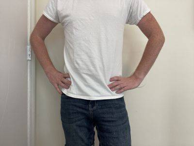 The Ultimate Travel Wardrobe Essential is the Plain White T-Shirt - travelsofadam.com