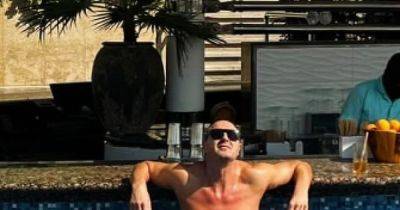Paddy McGuinness sends his 'apologies' as he shows off ripped physique in shirtless pool snap before fans make same joke - www.manchestereveningnews.co.uk - Britain - Dubai