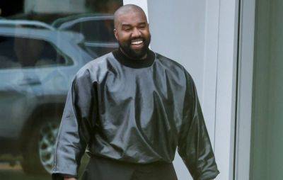 Kanye West seems to have replaced all his teeth with titanium dentures - www.nme.com - California