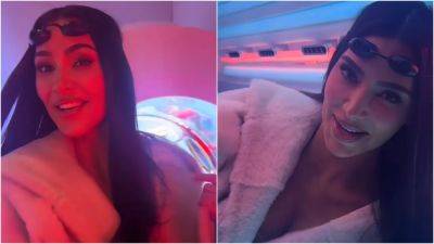 Kim Kardashian Defends Her Office Tanning Bed After Latest TikTok Backlash - www.glamour.com