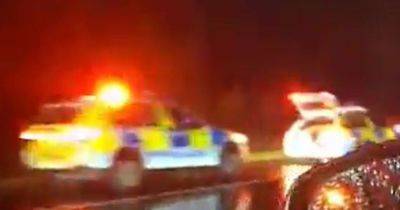 Police car smashes into metal barrier and flips over on M62 with two officers in hospital - www.manchestereveningnews.co.uk