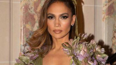 Jennifer Lopez Looks Like a Forest Fairy Queen in a Plunging Gown and Flowery Cape - www.glamour.com