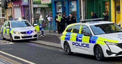 Shopkeeper injured outside Edinburgh store as man arrested over 'disturbance' - www.dailyrecord.co.uk - Scotland - Beyond