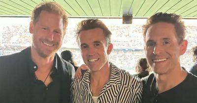 Prince Harry flashes huge grin as he poses with Hollywood star at football game without Meghan - www.ok.co.uk - Los Angeles - California - city Philadelphia
