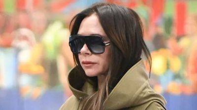 Victoria Beckham Travels in Spandex Pantaboots—Because the Airport Is Her Runway - www.glamour.com - Tokyo