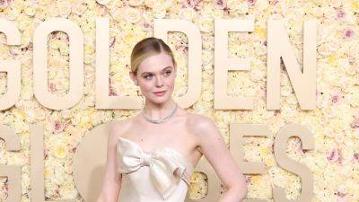Elle Fanning Wears Vintage Balmain Fit for a Queen to the 2024 Golden Globes - www.glamour.com