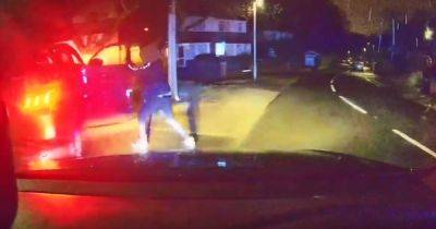Moment driver runs from police after 91 mph chase ends with a bump - www.manchestereveningnews.co.uk - Manchester