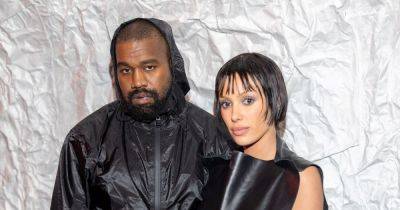 Kanye West's wife Bianca Censori sports barely-there leather bodysuit as they pack on the PDAs - www.ok.co.uk - Italy