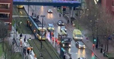 Emergency services seen swarming Salford Quays after person is hit by tram - www.manchestereveningnews.co.uk - Manchester - city Media