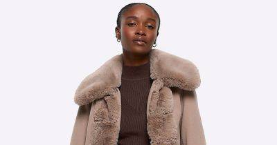 River Island's 'cosy' faux fur coat has been reduced from £110 to £45 in sale- save over 60% - www.ok.co.uk - Britain