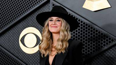 Lainey Wilson Changed up Her Uniform in a Johnny Cash-Inspired Grammys Look - www.glamour.com