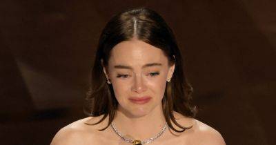 Emma Stone breaks down in tears as she suffers wardrobe malfunction amid Oscars win - www.ok.co.uk - France - county Baxter