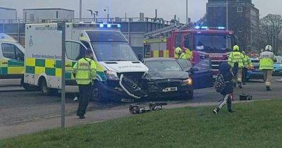 Woman trapped in car after crash with ambulance carrying patient near hospital - www.dailyrecord.co.uk - Scotland - Beyond