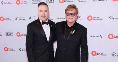 Elton John's husband gives health update on superstar after he was 'unable to walk' down red carpet - www.ok.co.uk