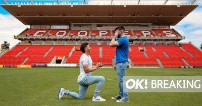 Football's first openly-gay male player engaged to electrician fiancé in sweet pitch proposal - www.ok.co.uk - Australia