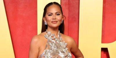 Chrissy Teigen Addresses Scarring From Plastic Surgery on Her Breasts After Oscars Parties - www.justjared.com