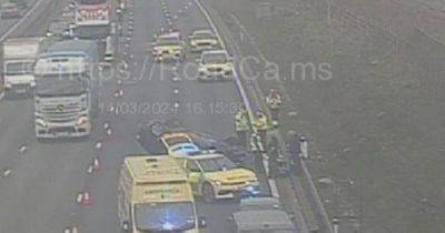 M6 blocked by emergency services after car flips - www.manchestereveningnews.co.uk