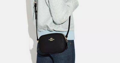 Coach handbag fans can save £190 on iconic crossbody that's now 68% cheaper in spring sale - www.ok.co.uk