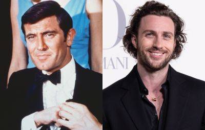 Former 007 George Lazenby approves of Aaron Taylor-Johnson as the next James Bond - www.nme.com - county Bond