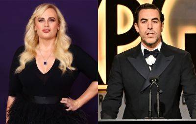 Rebel Wilson claims she has been “threatened” by Sacha Baron Cohen over plans to name him as “asshole” in memoir - www.nme.com - Australia