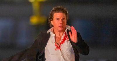 Tom Cruise sprints through London streets in blood-soaked shirt filming Mission Impossible - www.ok.co.uk - Britain - London